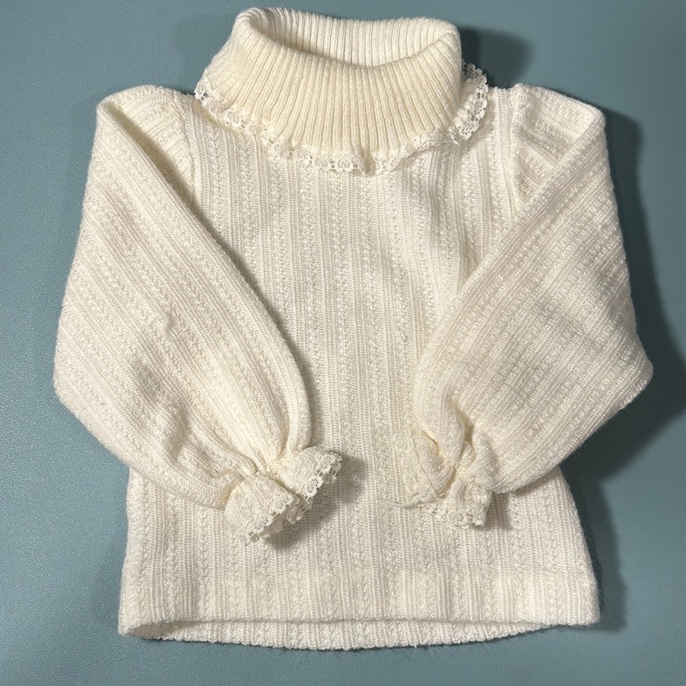 Vintage 90% acrylic net turtleneck sweater with balloons sleeves size 2